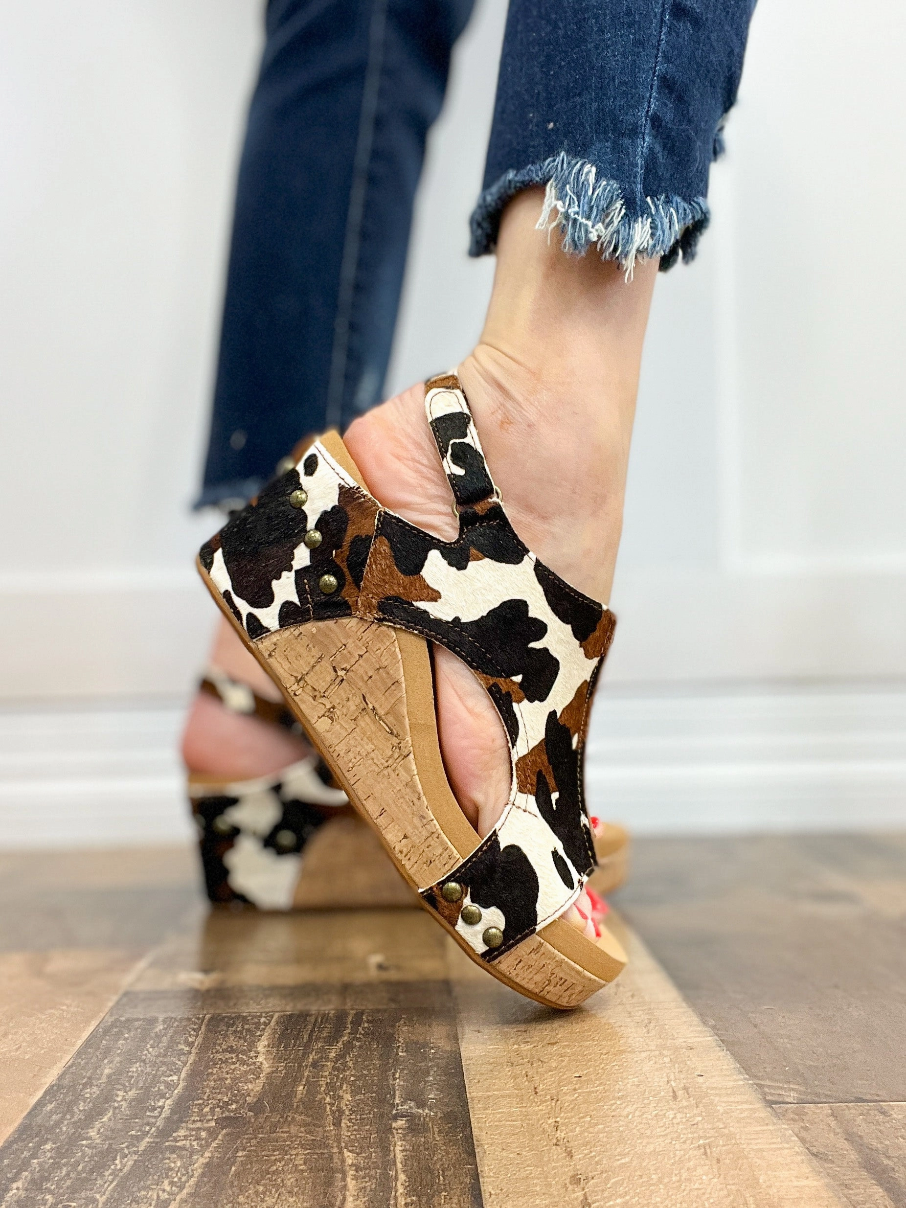 Corkys Pasture Wedge Sandals in Cow Print