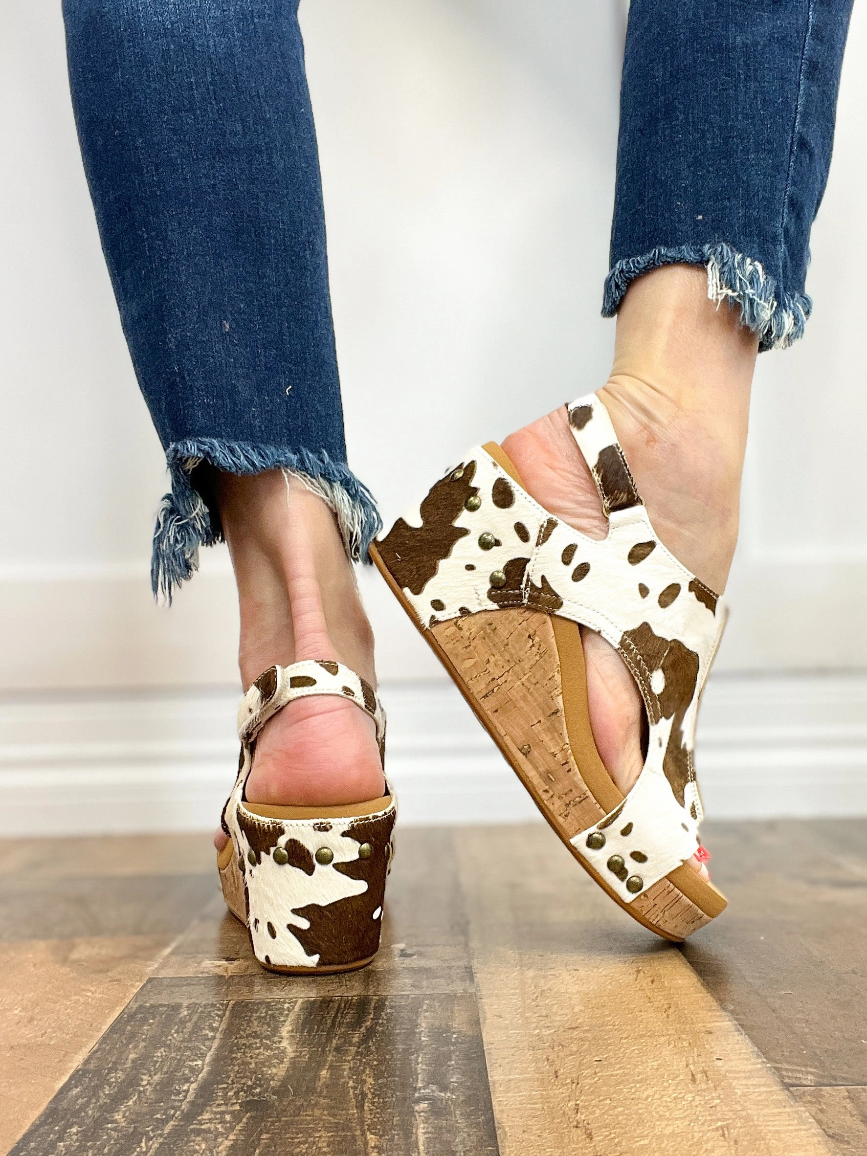Corkys Pasture Wedge Sandals in Cow Print